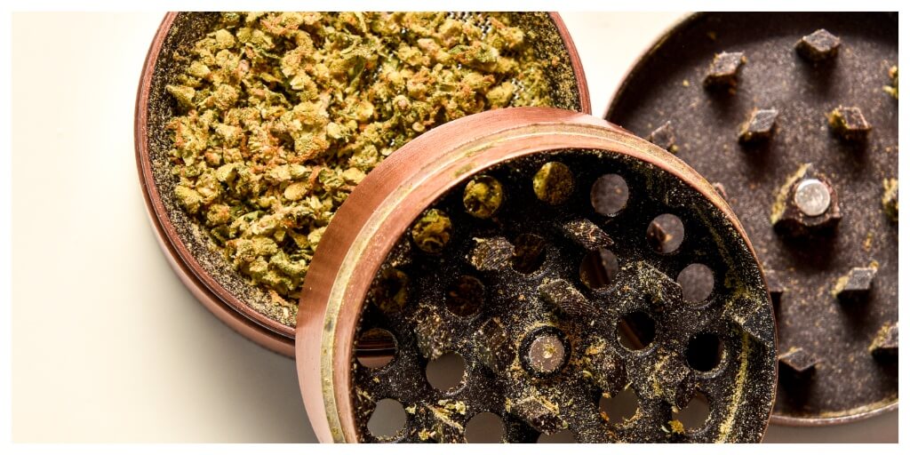 what to do with kief from your grinder, 4 piece grinder with weed on a white surface