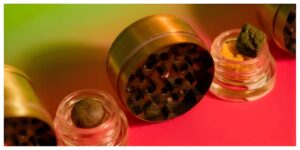 cbd hash vs thc hash comparison, colourful photo of grinder and two types of cbd hash